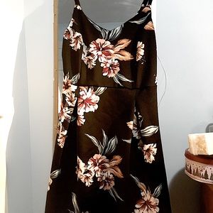 Short dress, stretchy material, adjustable straps, built in bra.